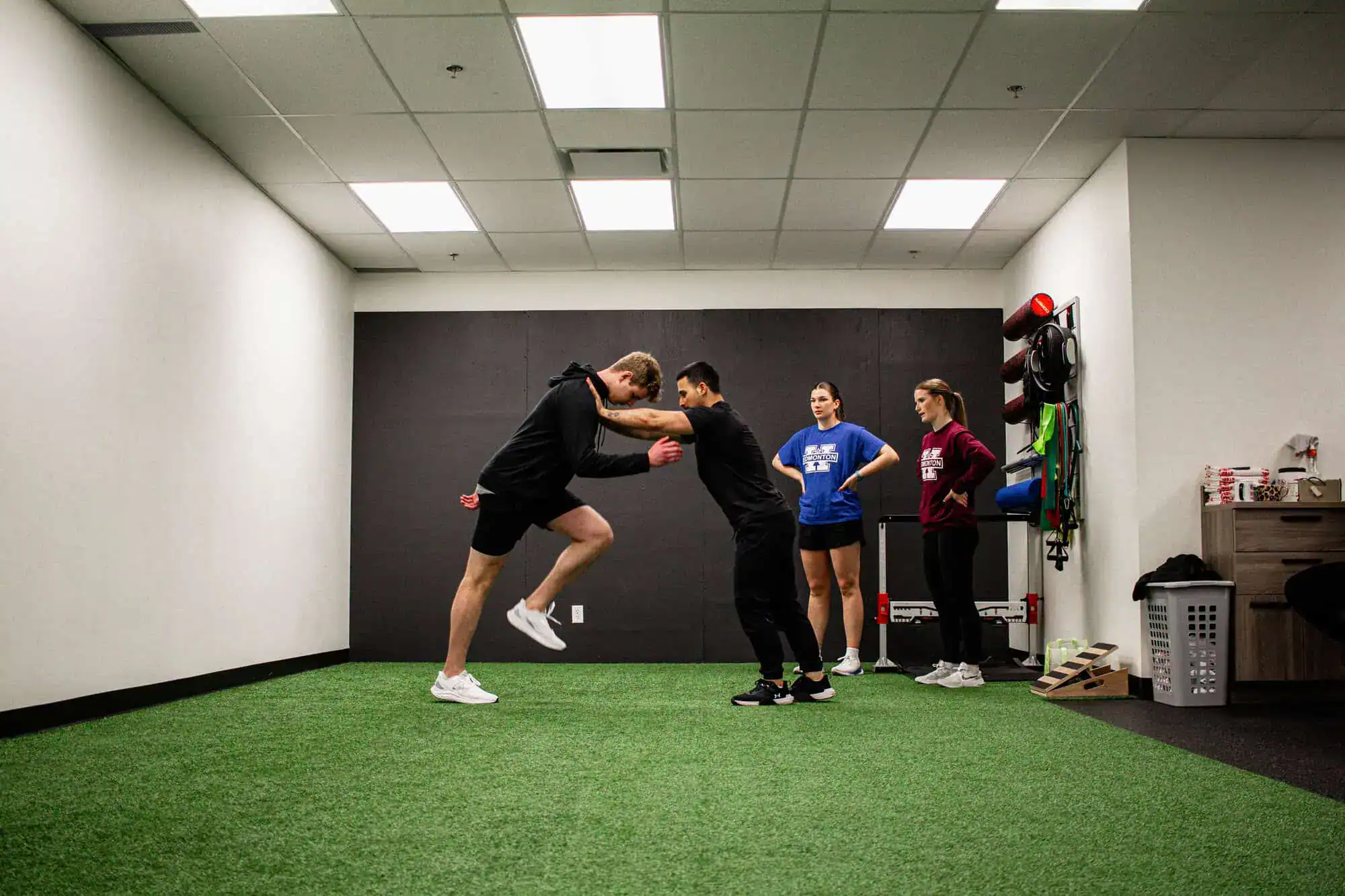 Coach leading sport-specific semi-private training