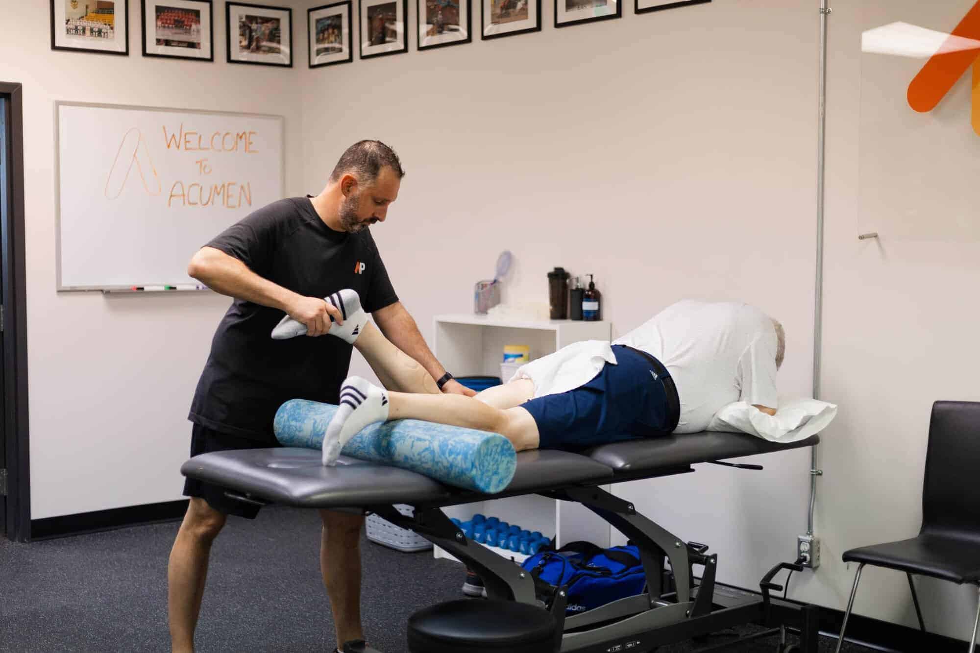 Clinician providing foot and ankle surgical assessment