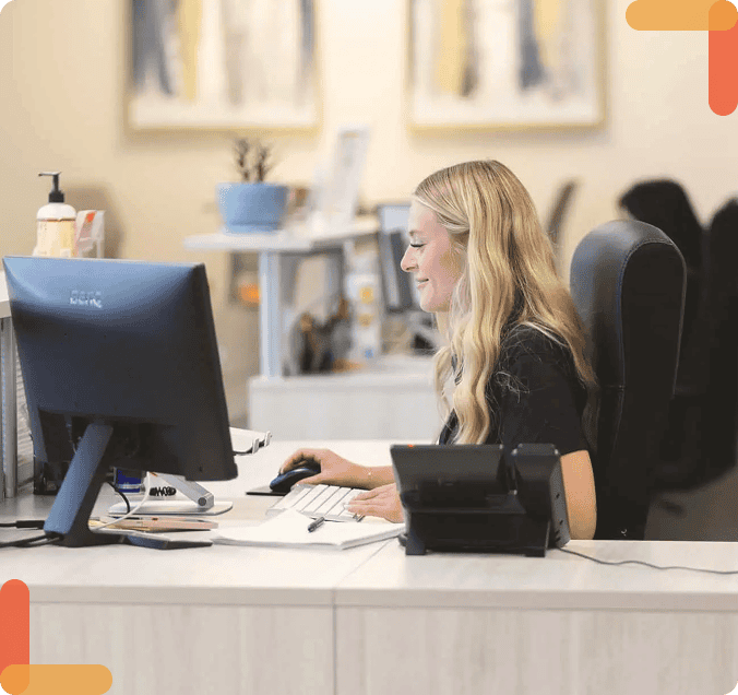 Patient care coordinator assisting with consultation scheduling at Acumen Health